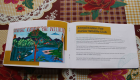 Photo 3:  Peak inside book- Annai Wildlife Club Banner and Story